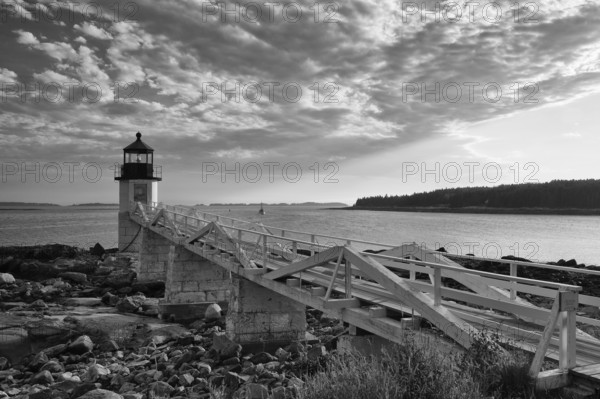 Marshall Point Light as seen from the rocky coast of Port Clyde - Black and White Photo