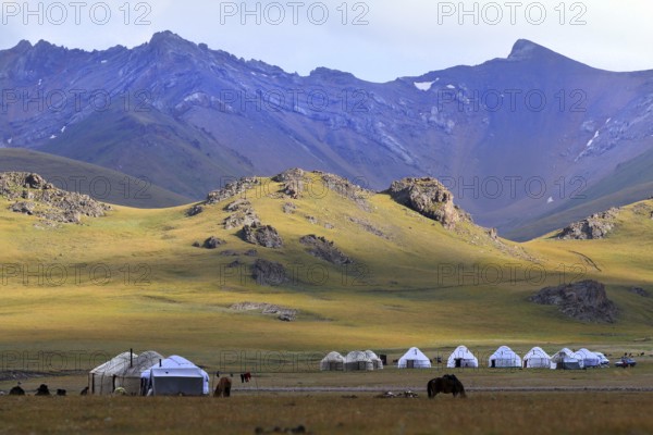 Yurt camp and high mountains at Lake Songköl (Son Kul, Song Kol), Kyrgyzstan