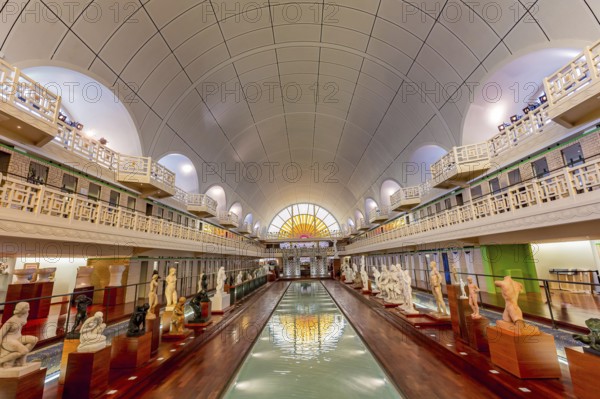 ROUBAIX, FRANCE, JUNE 14, 2024 : interiors Art Deco decors and sculptures of the olympic swimming pool La Piscine, built year 1927 by the Lille architect, Albert Baert