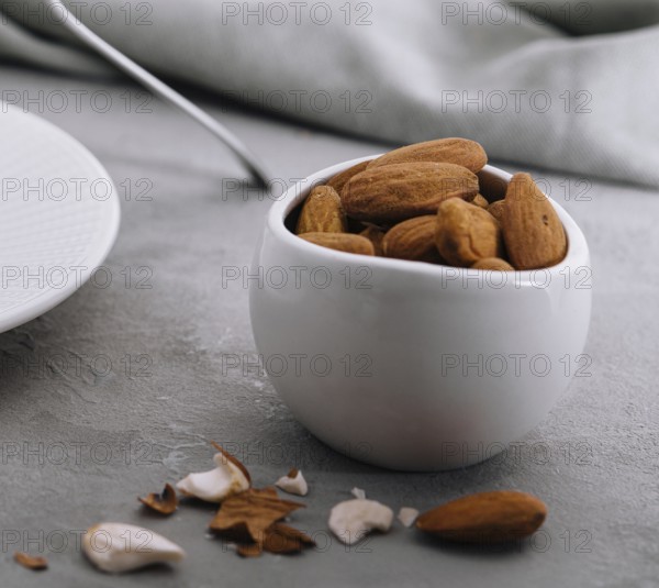 food still-life, Close up almonds on stone table