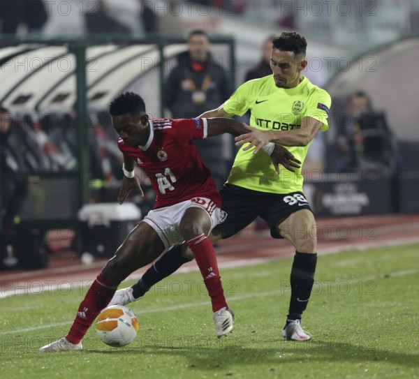 Sofia, Bulgaria - 22 October, 2020: Bradley Mazikou (L) of PFC CSKA-Sofia in action against Mario Rondon of CFR 1907 Cluj during the UEFA Europa League group A football match between CSKA Sofia and CFR Cluj, Sofia, Bulgaria