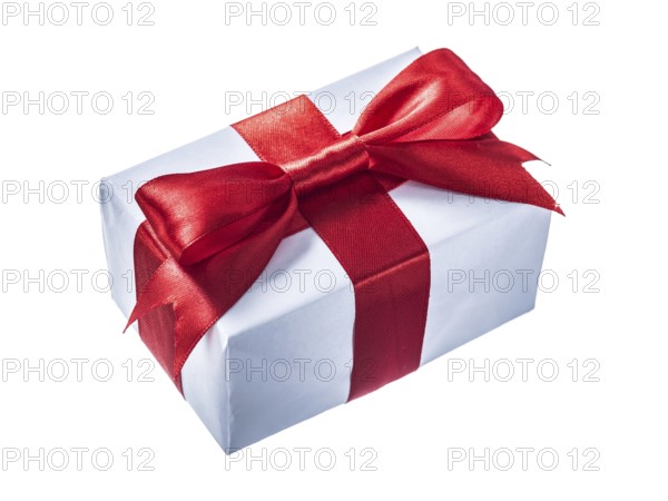 White gift box with red knot isolated on white