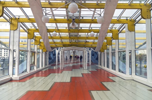 MOSCOW, RUSSIA, OCTOBER 2, 2016: Inside the pedestrian bridge that connects Berezhkovskaya and Rostov embankments near the Kiev railway station. Moscow, Russia