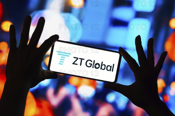 In this photo illustration, the ZT Global logo seen displayed on a smartphone