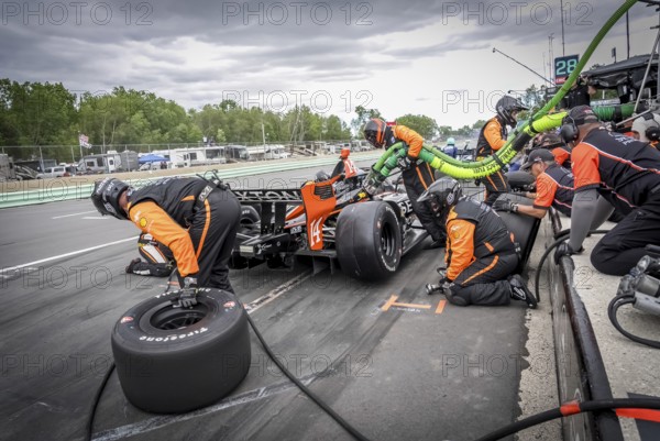 SANTINO FERRUCCI (14) of Woodbury, Connecticut comes down pit road for service during the XPEL Grand Prix at Road America in Elkhart Lake, WI