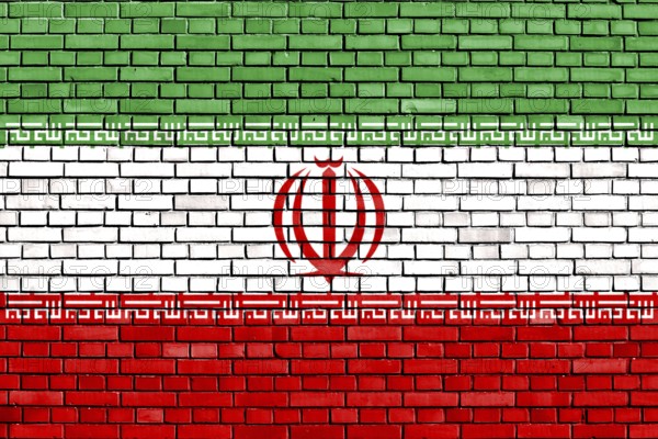Flag of Iran painted on brick wall