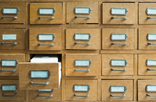 Old archive with wooden drawers