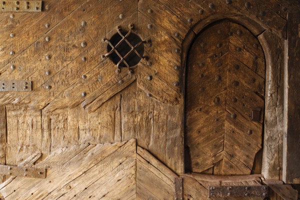 Castle gate with medieval wooden door