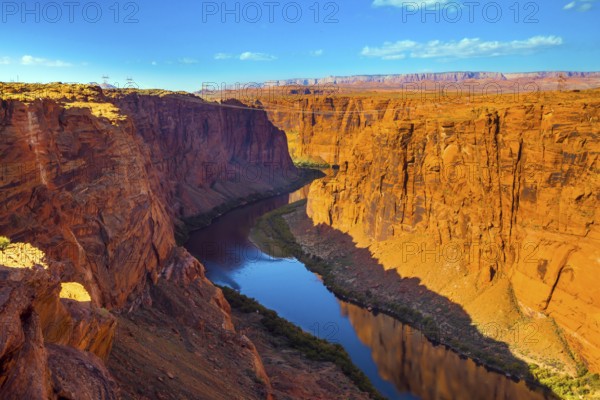 Glen Canyon Dam, Horseshoe Bend - horseshoe-shaped bend of the Colorado River in the Glen Canyon. Travel to the USA. The concept of active, environmental and photo tourism