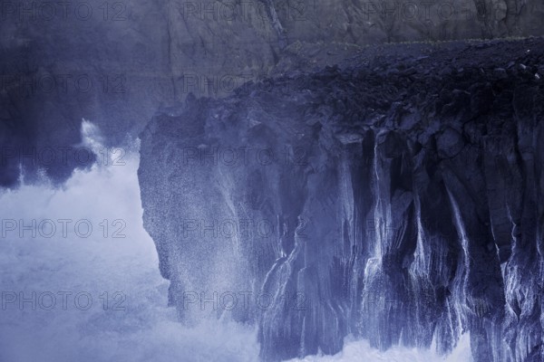 Ocean waves with splash break on volcanic cliffs, Azores