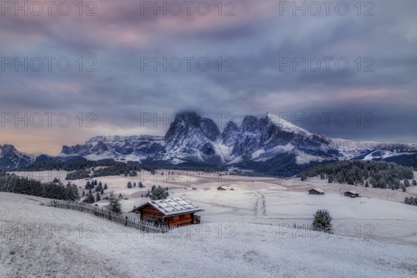 Snowy Alpe di Siusi, Seiser Alm, Sassolungo a Sassoplatto before sunrise