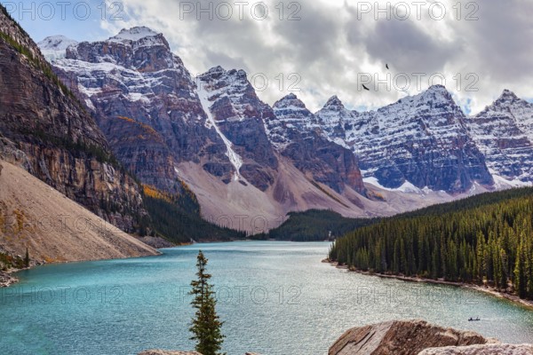 Canada. The most beautiful mountain lake Moraine. The picturesque valley of the Ten Peaks surrounds the magnificent lake. Mountains covered with snow