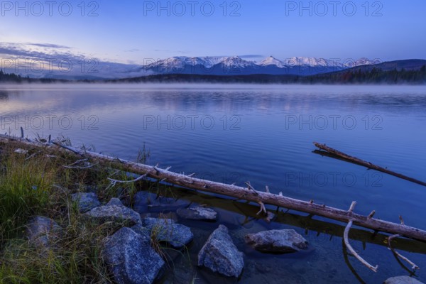 Beautiful autumn landscape scene in mountain in background in Jasper National Park west Canada with birds