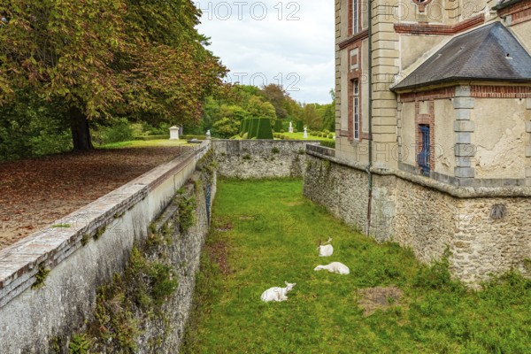 Castle of the noble family of Breteuil. Beautiful well-kept park surrounds the ancient castle of Breteuil. France