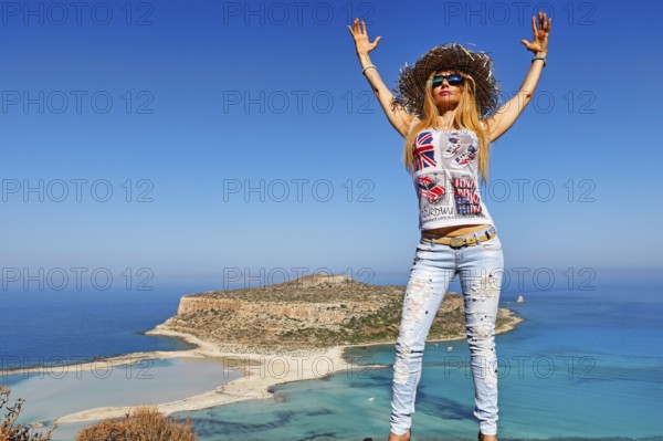 A beautiful woman over the beach Balos of Creta, Greece