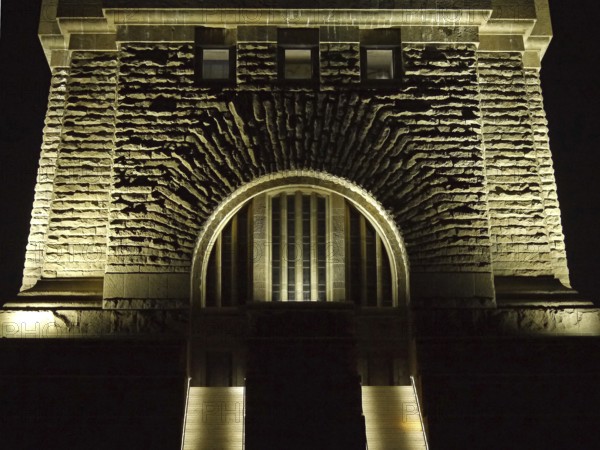 Staircase and masonry at the illuminated Monument to the Battle of the Nations at night. Leipzig, Saxony, Germany