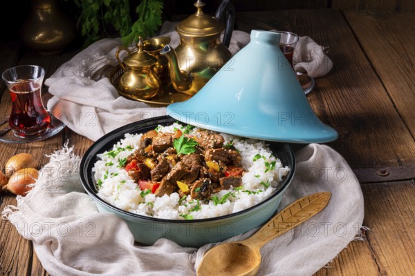 Tajin beef stew with rice, peppers and sesame seeds
