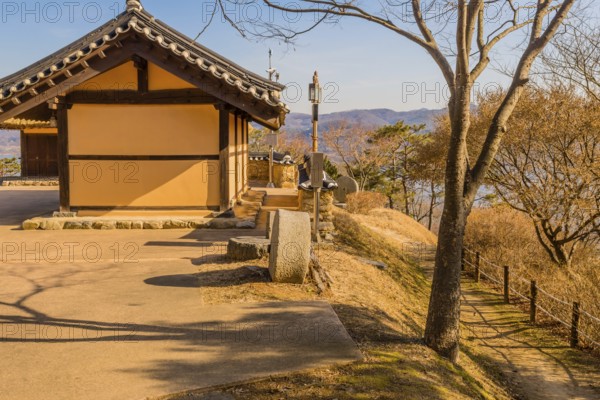Daejeon, South Korea, January 16, 2020: Side view of traditional Korean building with ceramic tile roof in public park