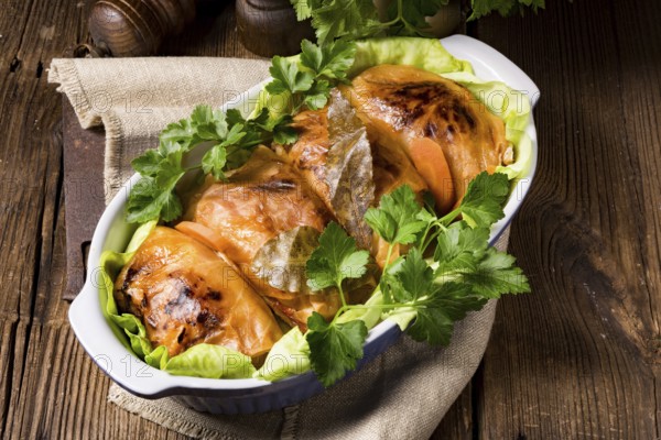 Baked cabbage rolls in tomato sauce