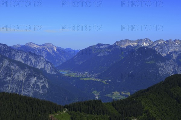 Paragliding above Spieljoch in the Zillertal valley viewing to the Inn valley