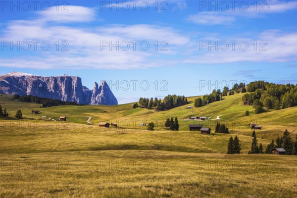 Jagged rocks around the Dolomites valley. The Alps di Siusi. Well-known international ski resort in the fall. Concept of active and ecological tourism