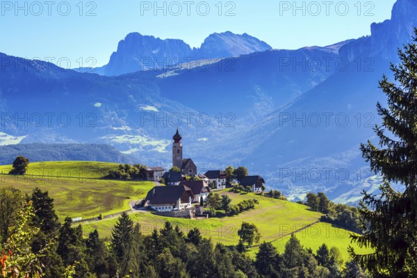 Little village in the Dolomites. Magnificent Tyrol. Journey to the fairy-tale country. The concept of ethnographic and ecotourism