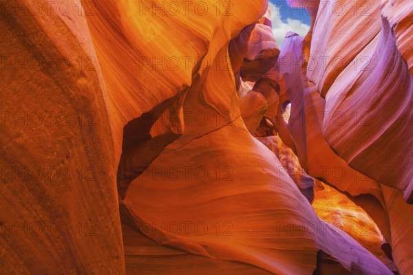 Fantastic slot-canyon Antelope in the Navajo reservation. Bright red and orange colored clay covered delightful magical light. Arizona, USA