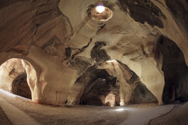 Ancient caves for the extraction of building materials. The famous underground national park Beit Guvrin, Israel. Sunny warm day for a successful excursion. Israel