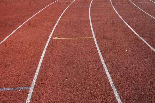 Wet synthetic track in the athletics stadium