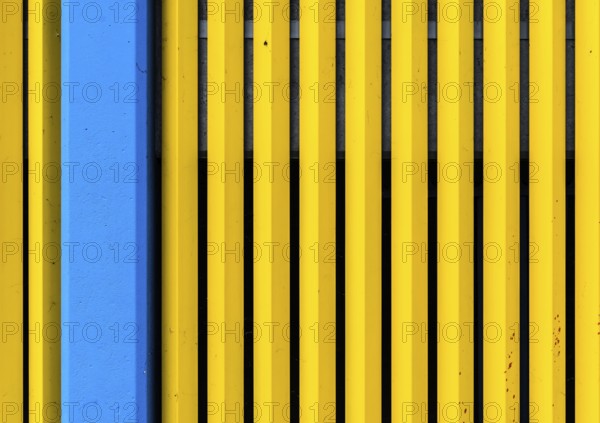 Laeken, Brussels Capital Region, Belgium, 09 26 2019 Abstract creation of an industrial wall with colorful vertical lines and stripes