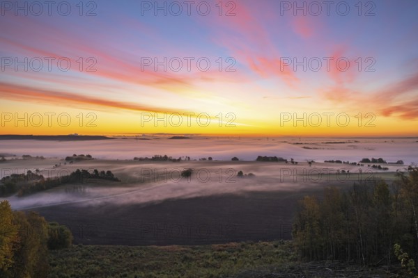 Sunrise with fog in the landscape