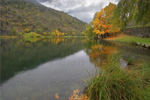 Small lake in city park of the French small town