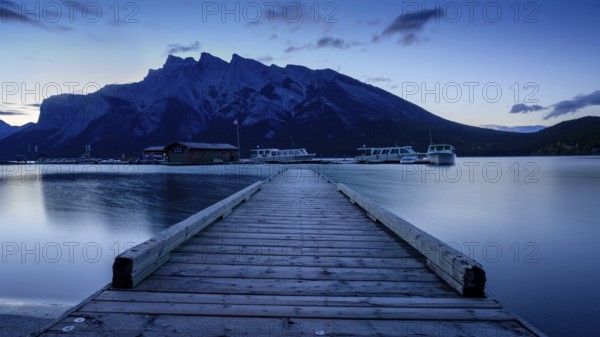 Beautiful autumn landscape scene in lake and mountain in background in west Canada