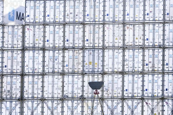 Stacked containers of the Danish logistics company Maersk on a container ship in the port of Hamburg, Germany