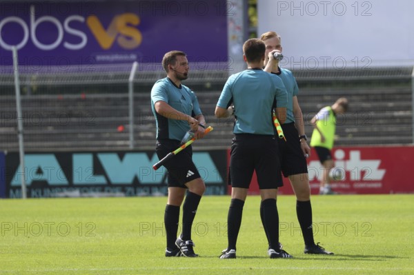 Drink break: Even the referees are thirsty in the summer heat at the SW 24-25 football league match: Sptg. 6: FC 08 Villingen vs Eintracht Frankfurt U21, Villingen-Schwenningen, Germany / Germany