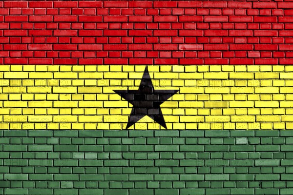 Flag of Ghana painted on brick wall