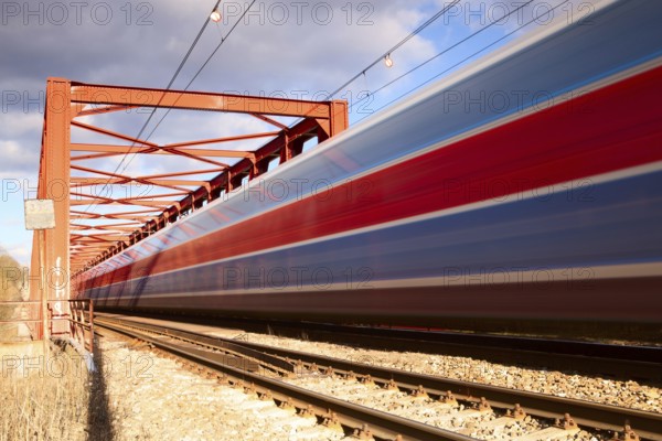The speed train on the old iron bridge