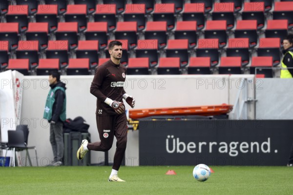Advertising caption outstanding applies to goalkeeper Nikola Vasilj (FC St. Pauli) in the 1st FBL match: 24-25: 1st FBL: 24-25: 5th Sptg. SC Freiburg - FC St. Pauli DFL REGULATIONS PROHIBIT ANY USE OF PHOTOGRAPHS AS IMAGE SEQUENCES AND/OR QUASI-VIDEONan Photo: Joachim Hahne/johapress, Freiburg, Germany / Germany