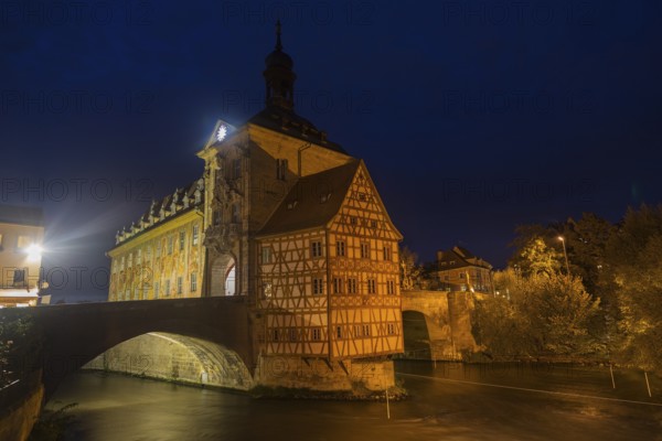 Obere bridge (brücke) and Altes Rathaus at night in Bamberg, Germany