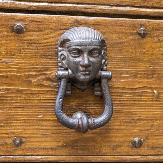 Close up of rustic old door in Spoleto, Italy