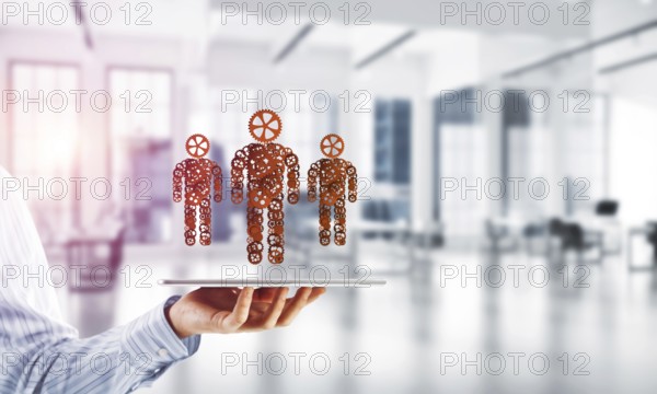Concept of cooperation or maybe team with three figures presenting teamwork and relations