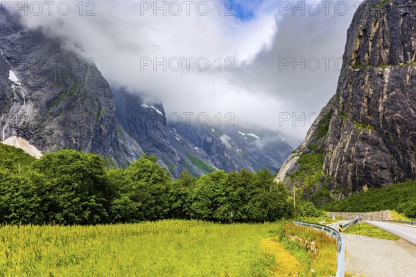 The majestic and famous Troll Wall Trollsvegen. Summer trip to Norway. Warm cloudy day. Northern Europe in July