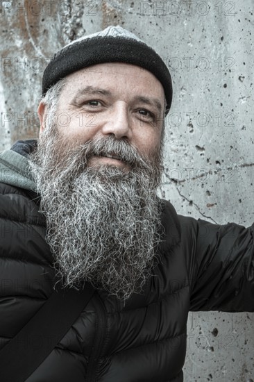 An image of a bearded man outdoor cold weather