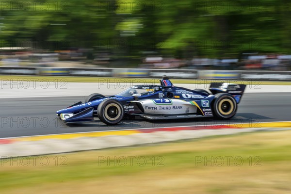 GRAHAM RAHAL (15) of New Albany, Ohio travels through the turns during a practice for the Sonsio Grand Prix at Road America in Elkhart Lake WI