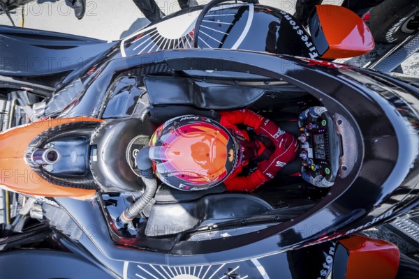 SANTINO FERRUCCI (14) of Woodbury, Connecticut straps into his vehicle as he prepares to practice for the Firestone Grand Prix of Monterey at WeatherTech Raceway Laguna Seca in Salinas, CA
