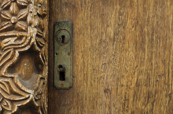 Antique ornaments on wooden door