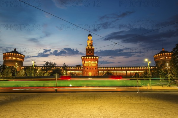Sforzesco Castle and tram in the evening, Milan, Italy
