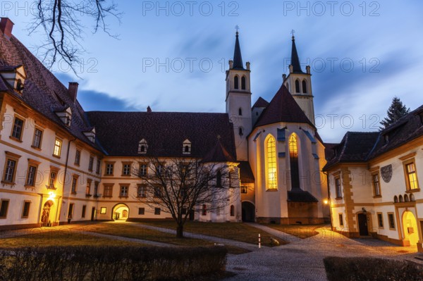 Abbey courtyard of Göß Abbey, blue hour, former convent of the Benedictine nuns, Leoben, Styria, Austria