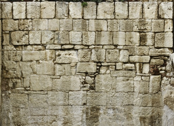Stock photo of an Ancient stone wall texture Yellow limestone background from Cyprus Horizontal