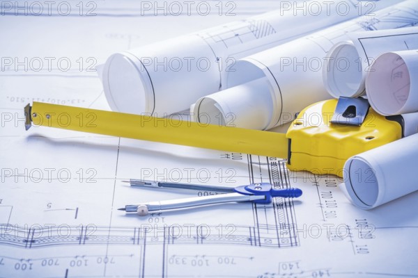 Tapeline compass rolls of blueprints